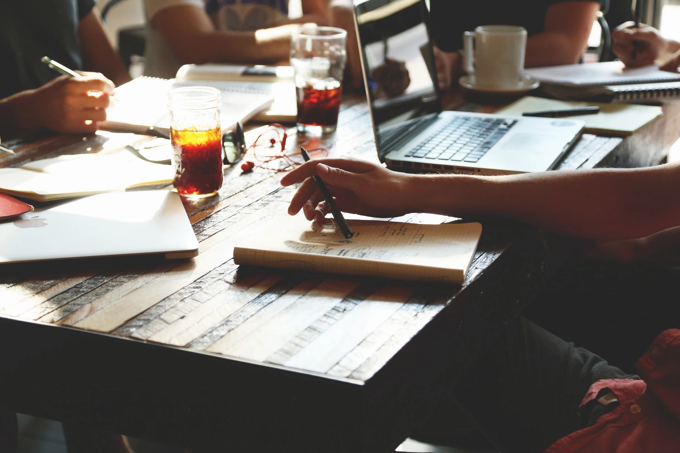 Photo of people at a brainstorming table